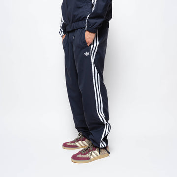 ADIDAS Skateboarding - Superfire Track Pant (Aurora Ink/White)