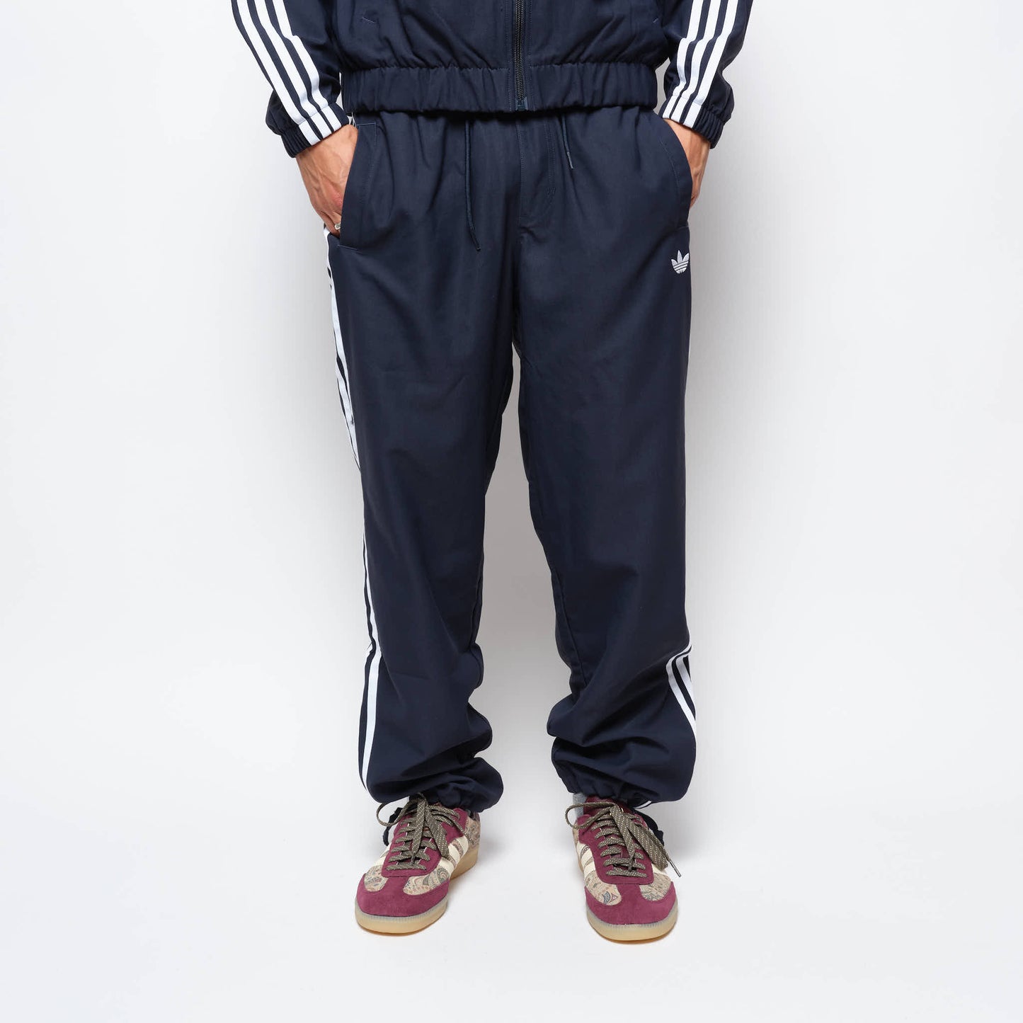 ADIDAS Skateboarding - Superfire Track Pant (Aurora Ink/White)