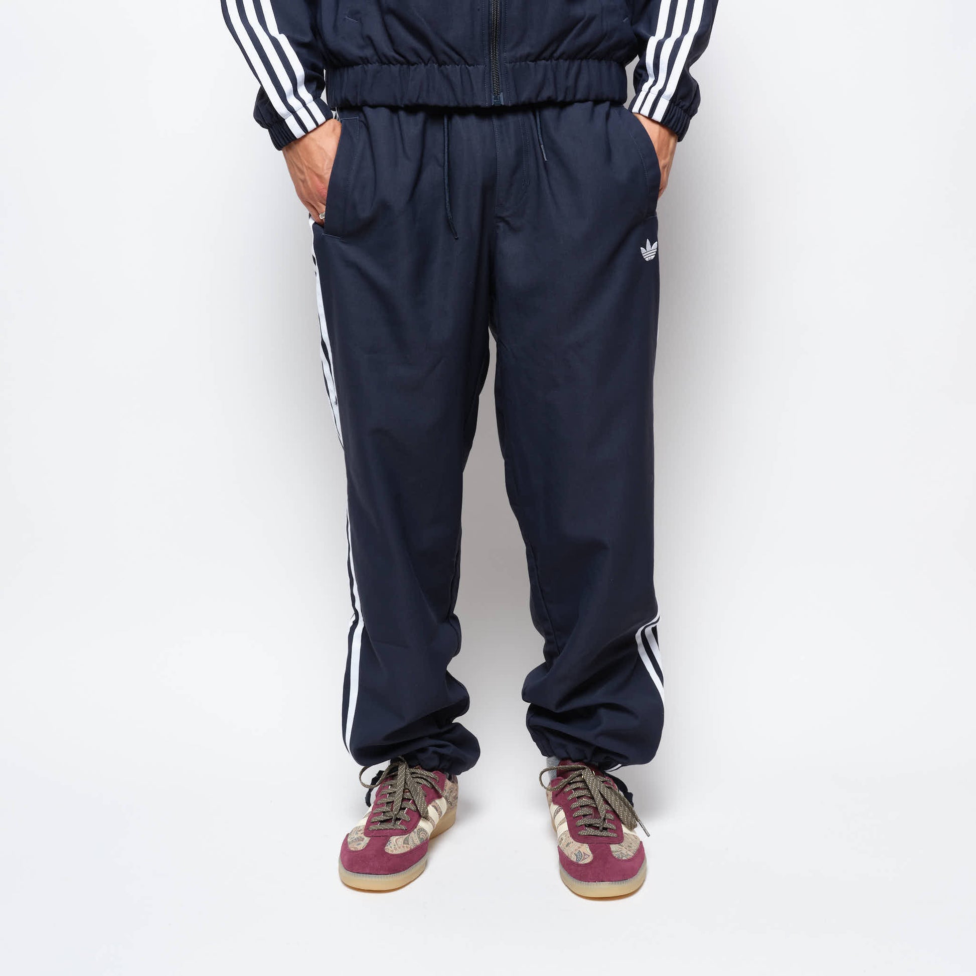 ADIDAS Skateboarding - Superfire Track Pant (Aurora Ink/White)