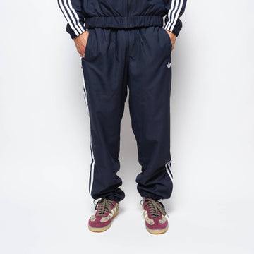 ADIDAS Skateboarding - Superfire Track Pant (Aurora Ink/White)
