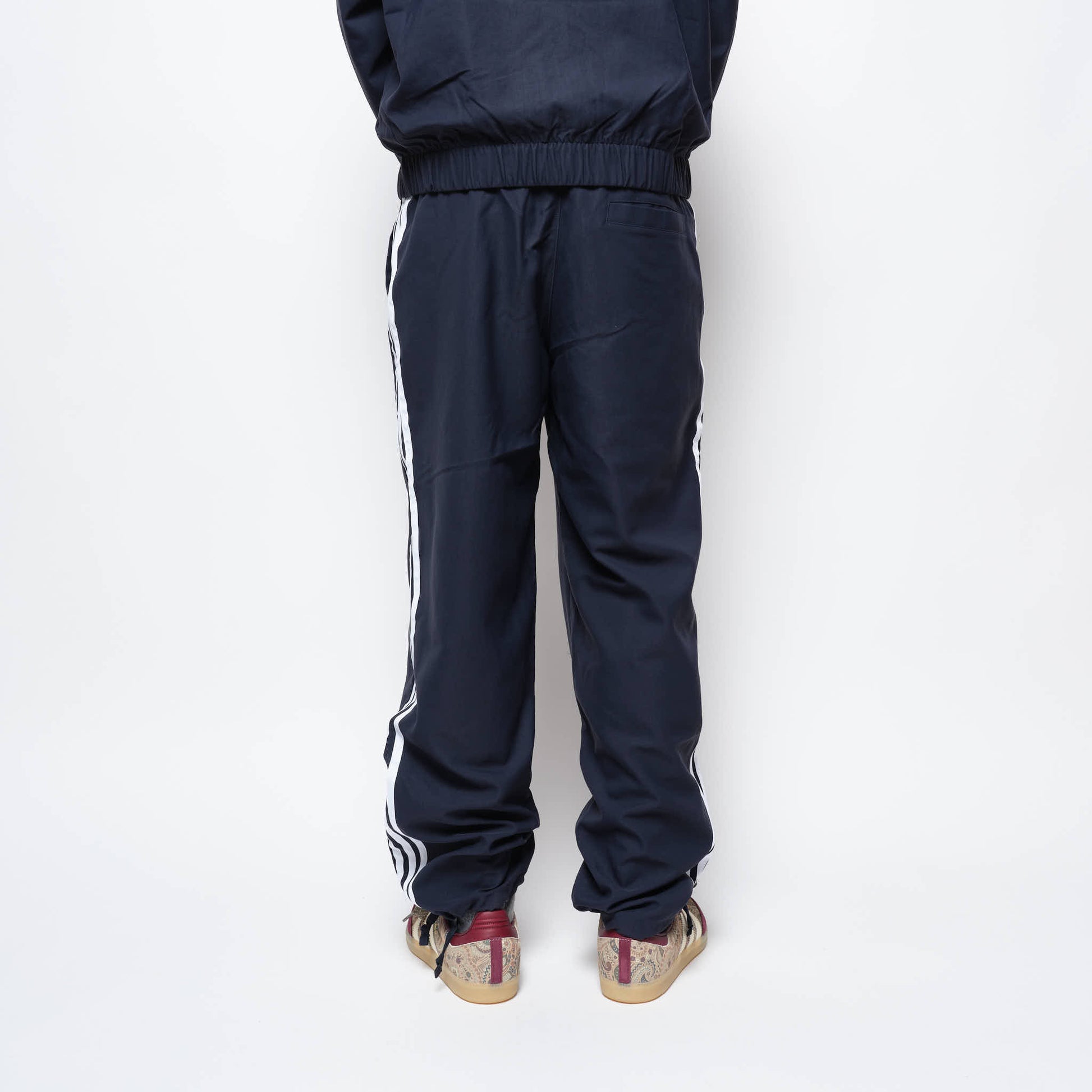 ADIDAS Skateboarding - Superfire Track Pant (Aurora Ink/White)